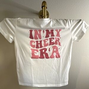 NWOT youth sz11 Tshirt white/pink “In my Cheer Era” baby soft material